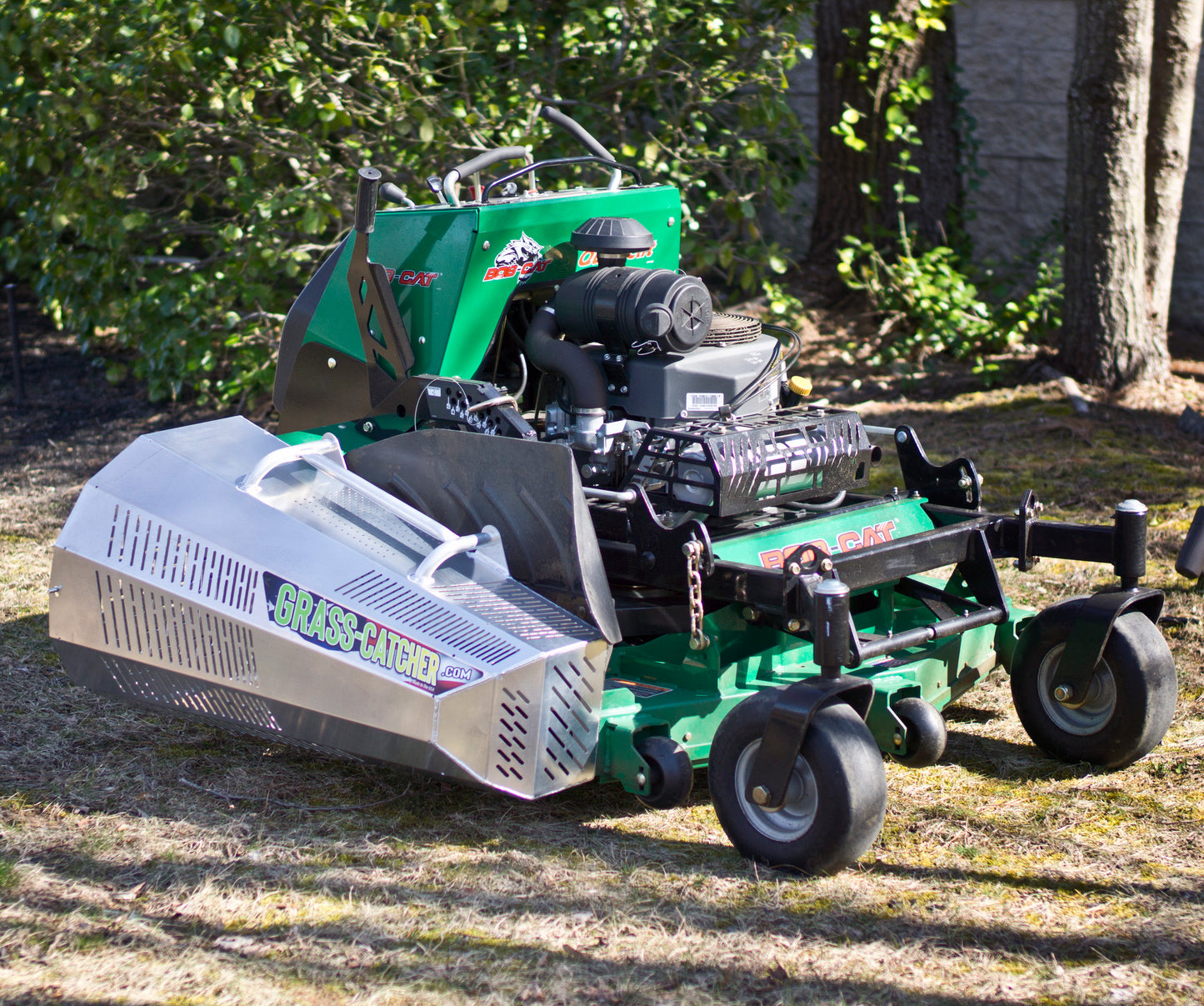 Bob-Cat QuikCat stand on commercial mower. Bob-Cat aluminum grass catcher.